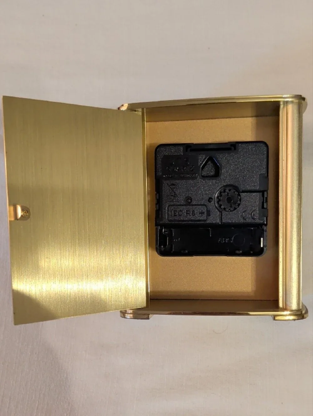 Tiffany & Co. Gold Frame Clock with White Dial